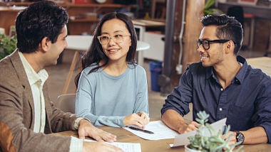 three-people-at-meeting