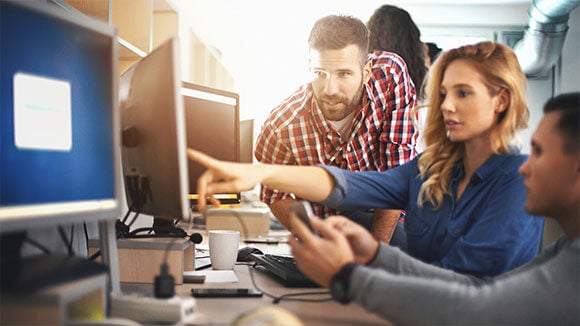 three-people-working-at-pc three-people-working-at-pc