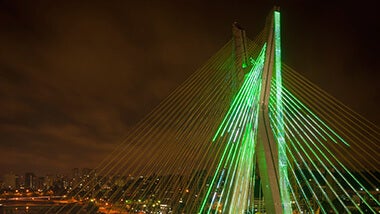 neon green light bridge in the evening